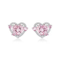 A pair of women's heart-shaped stud earrings with a white K electroplated finish on a copper base.