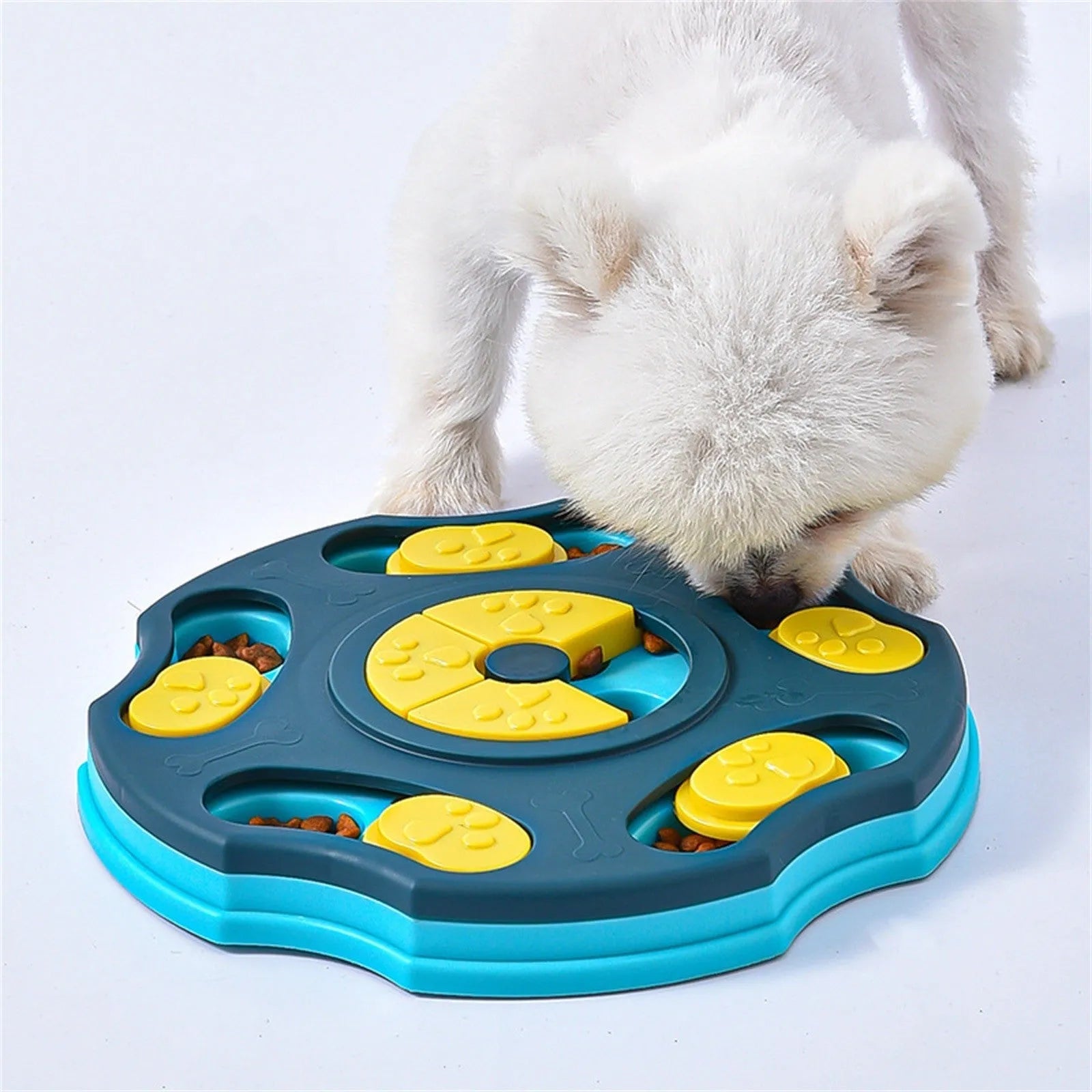 Blue durable plastic dog puzzle toy feeder with interactive food-searching compartments for slow feeding.