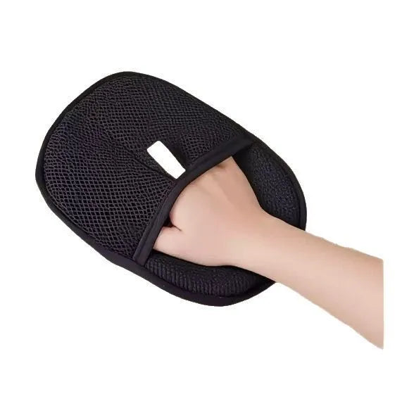Black pet deshedding glove with silicone bristles for grooming dogs, cats, and rabbits.
