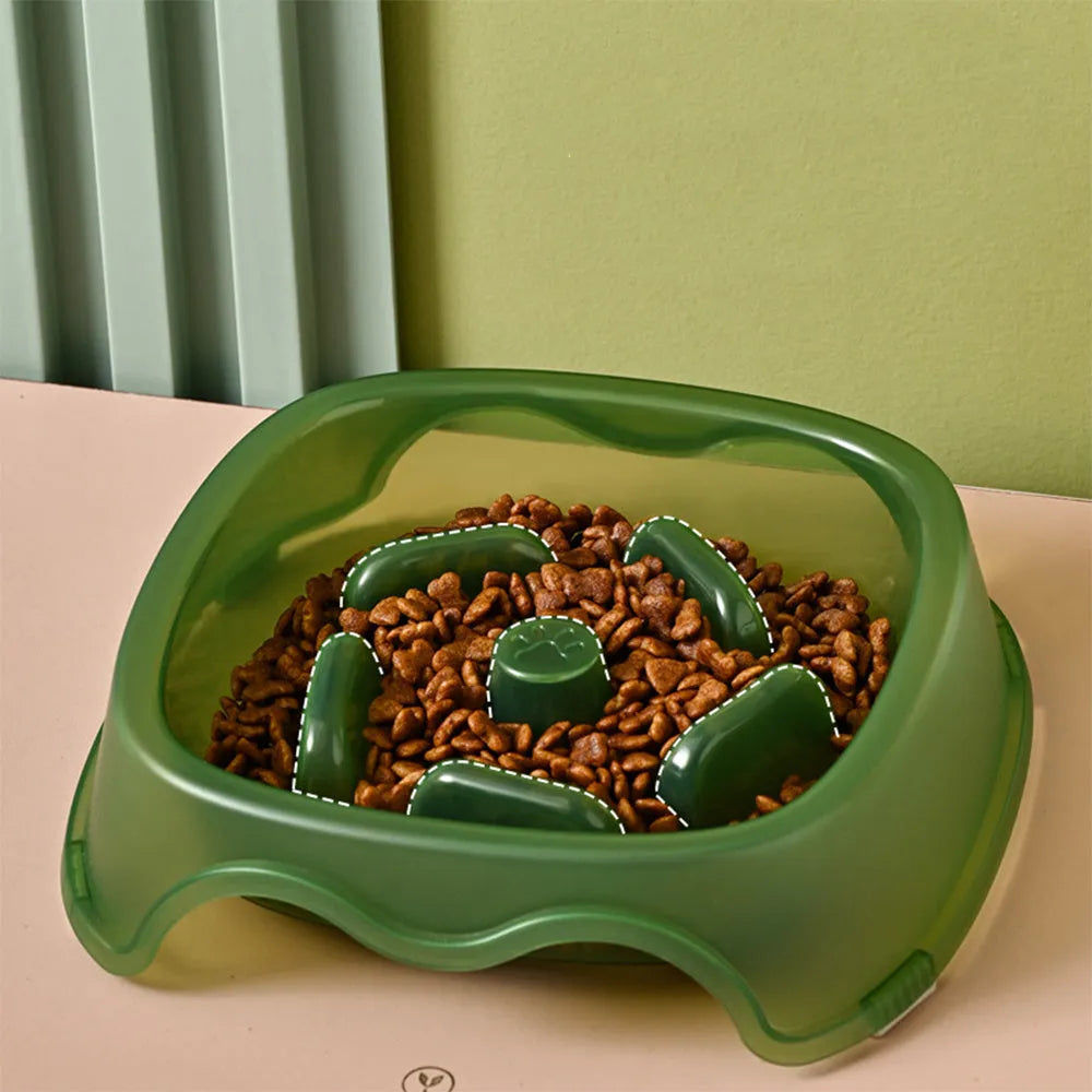 Blue slow feed anti-choke dog bowl with raised centre pattern on a non-slip base.