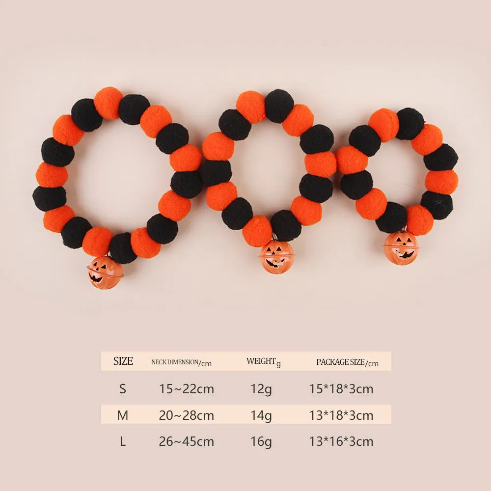 Halloween cat collar with orange pumpkin design showing trick or treat text and ghost bat decorations