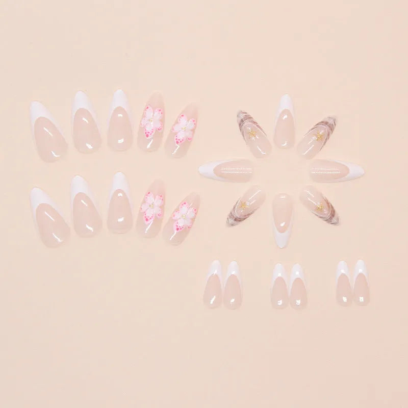 Press-on fake nails with flower French style and grey rock pattern patches on a white tip, W1764 colour.