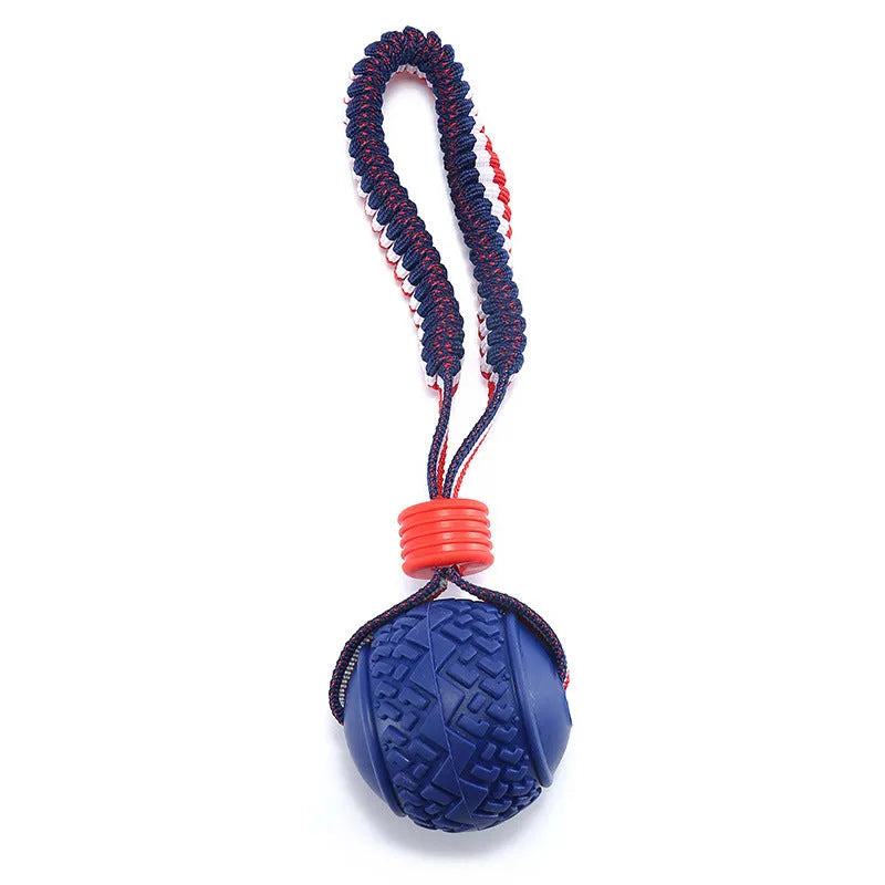 Blue dog toy with a textured rubber ball attached to a rope for tug-of-war and chewing