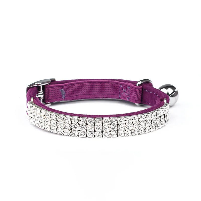 Red velvet cat collar with rhinestones, adjustable buckle shown.