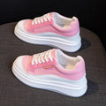 Beige and pink women's cowhide leather platform board shoes with a thick sole.