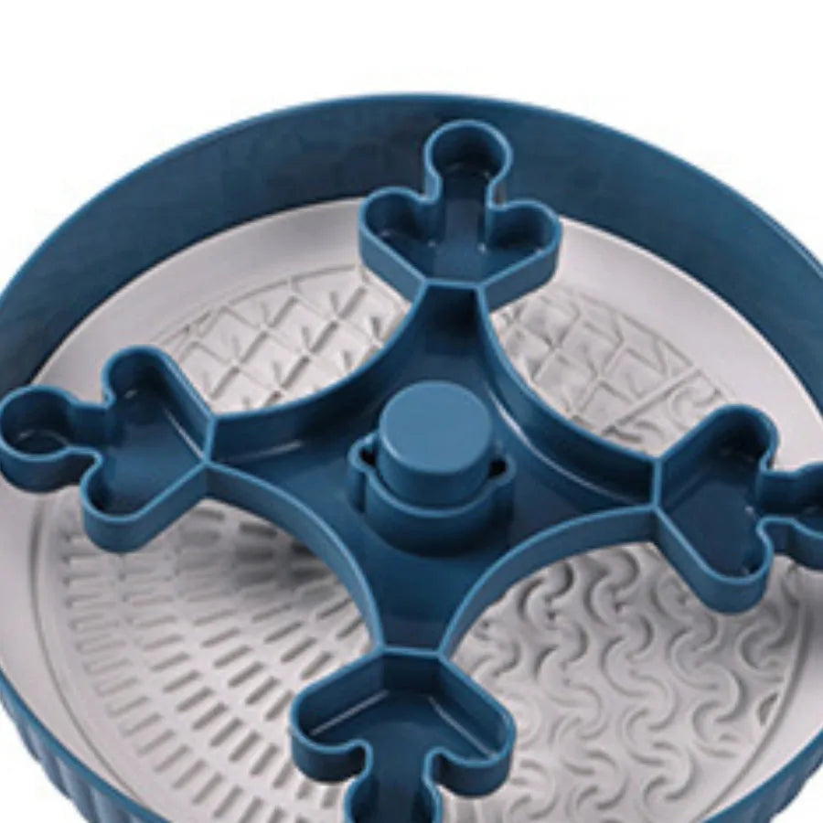 Pet slow feeder bowl with silicone licking mat in rotating game board design