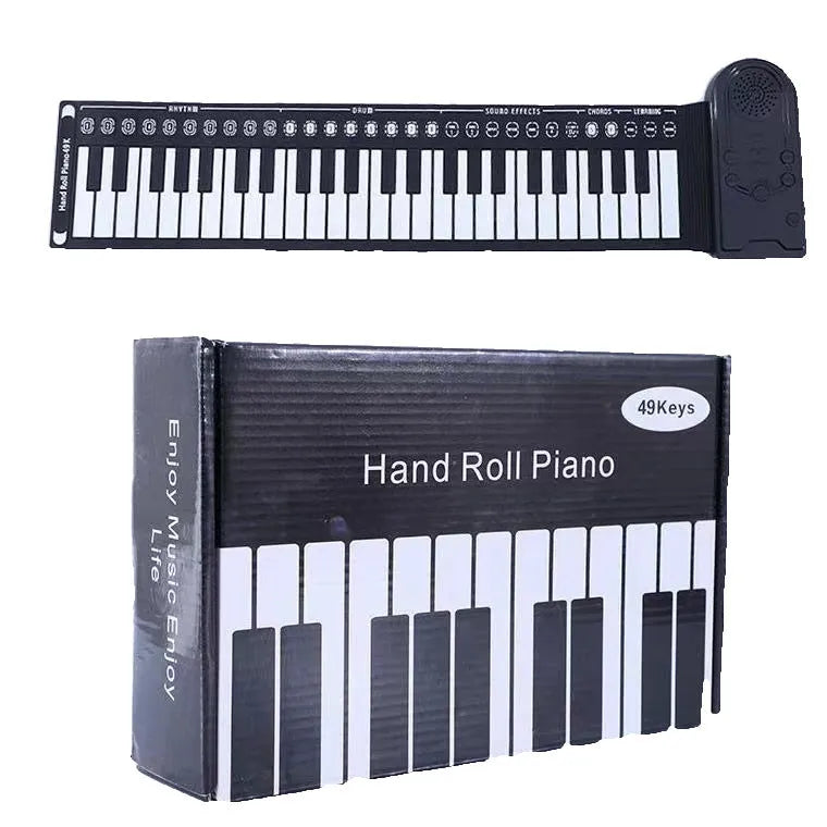 Portable black folding electronic keyboard rolled up next to its control panel and cable.