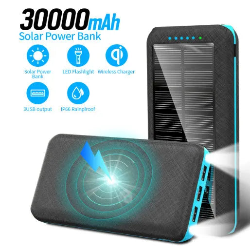 Black portable power bank with wireless Qi charging pad, three USB ports, and LED flashlight