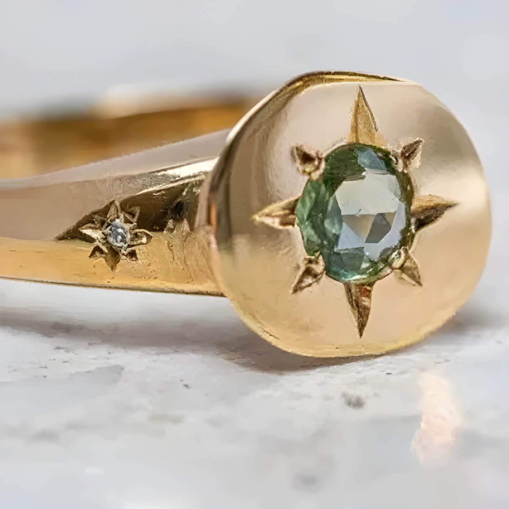 Adjustable gold ring with oval asterism zircon star shape centrepiece on zinc alloy band