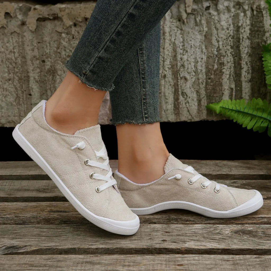 Women's beige fabric casual sneakers with low-top design and rubber sole