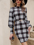 Black tight dress with lantern sleeves and leather stitching details, mid length skirt with mid waist