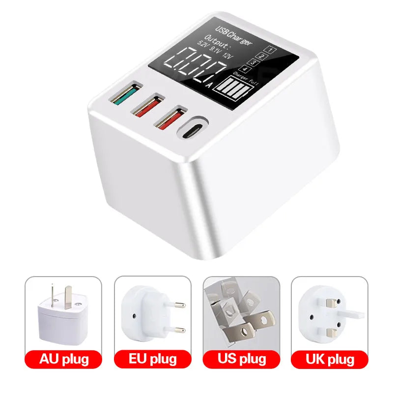 White 4-port QC3.0 and Type-C fast travel charger with optional international plugs on a table.