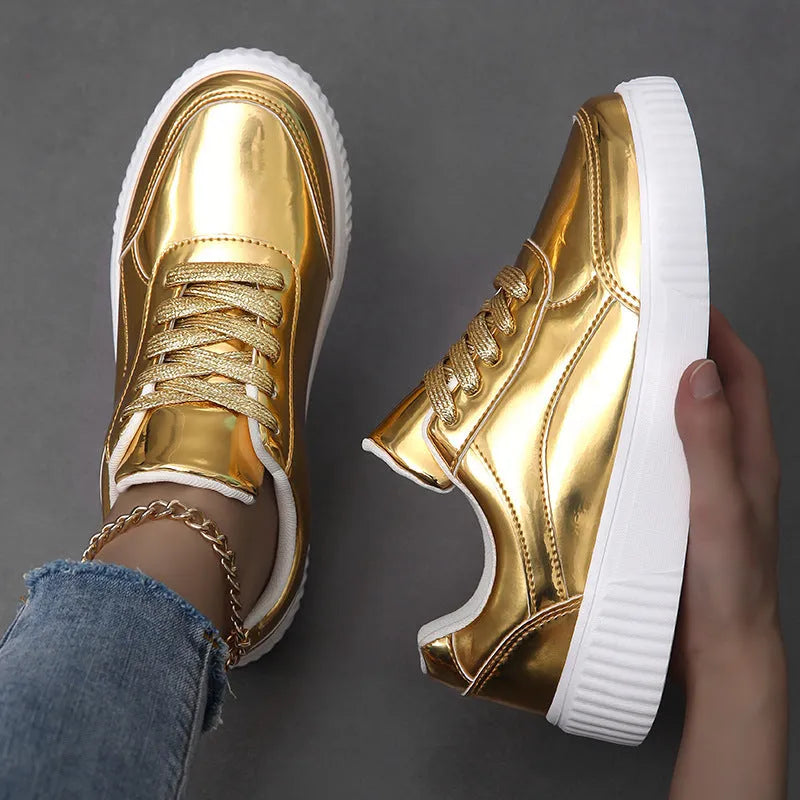 Thick-soled sequin platform sneakers in metallic gold colour with round toe