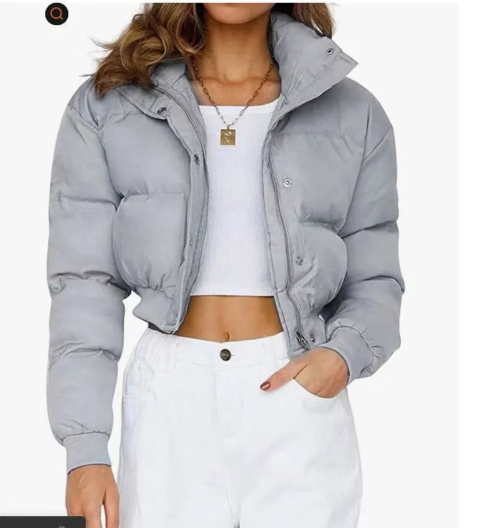 Women's loose fit polyester jacket in blue with long sleeves