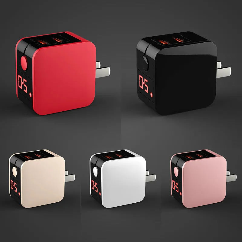 Black 5V2A dual USB travel charger with digital display showing charging status next to a smartphone.