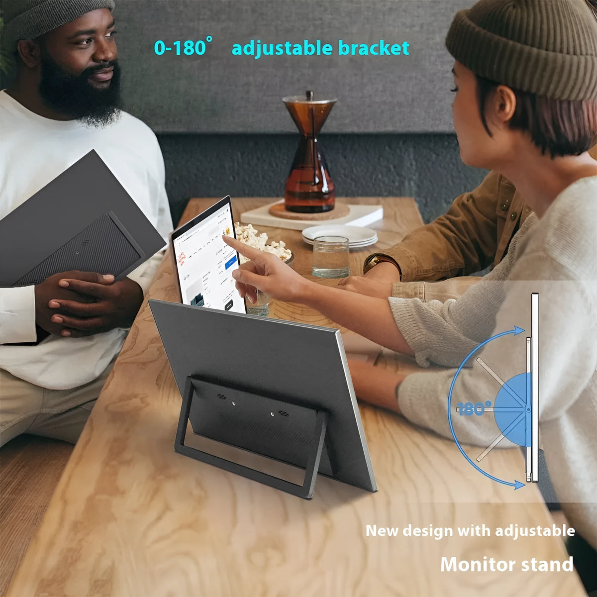 Black 15.6-inch portable monitor with adjustable stand on desk