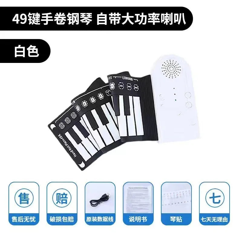 Portable black folding electronic keyboard rolled up next to its control panel and cable.