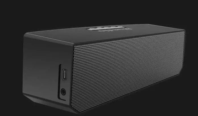Black cloud smart speaker with compact design showing dimensions and Micro-USB charging port