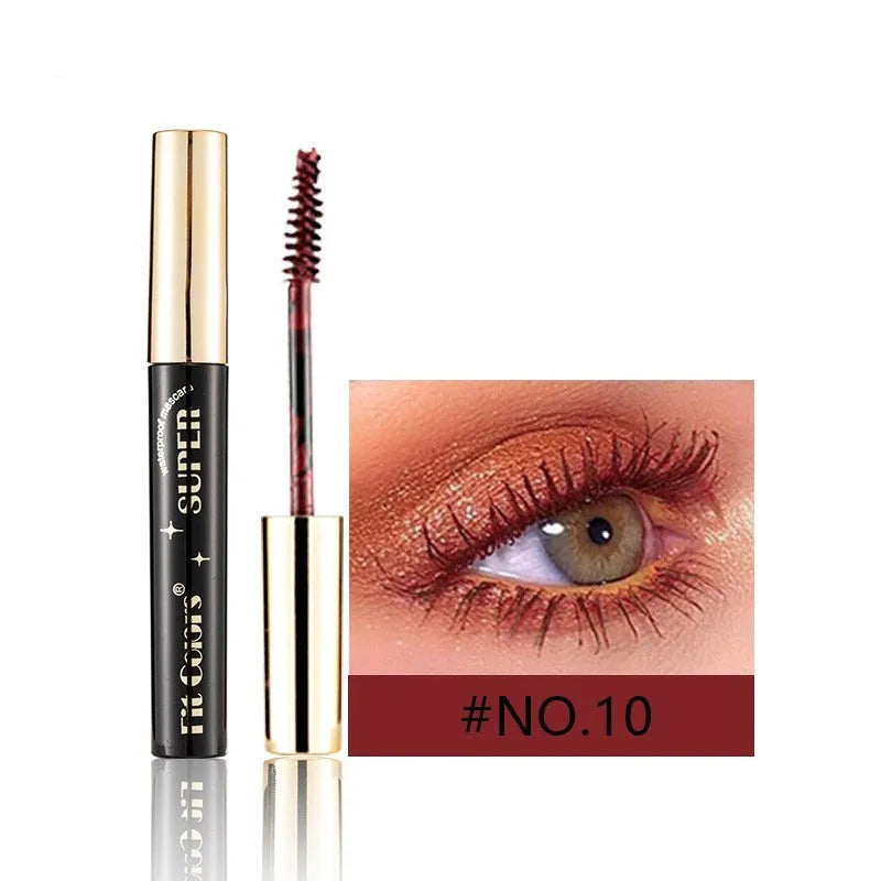 Colourful waterproof mascara tube displaying vibrant shades like wine red, gold, and mermaid green for stage and event makeup.