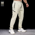 Men's waterproof quick-drying nylon workout pants in Army Green colour, showing mid waist design and trousers length