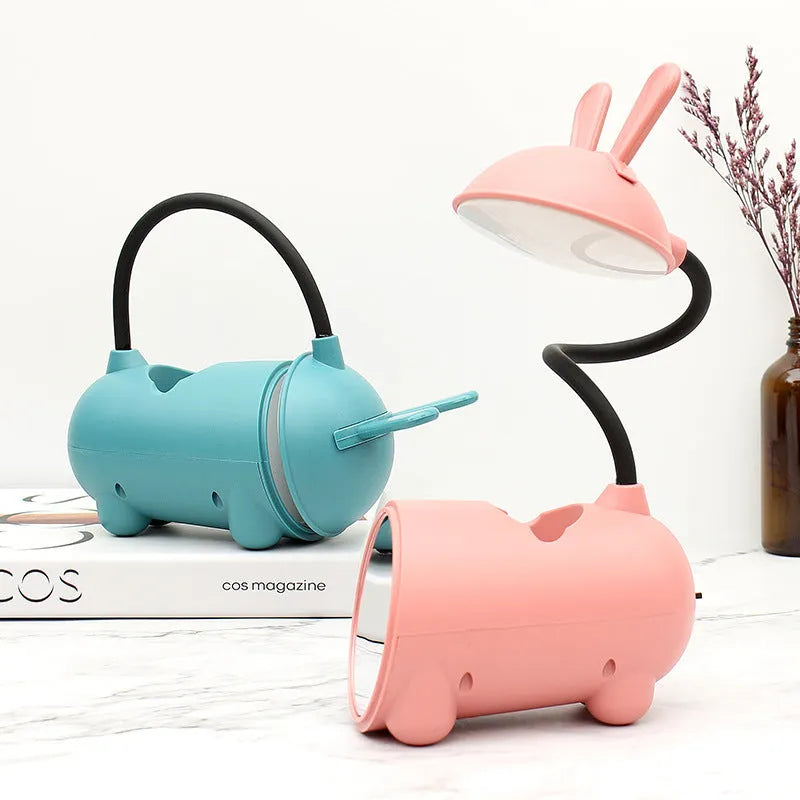 Cartoon-style USB desk lamp with pen container in green colour, dimensions 30cm long