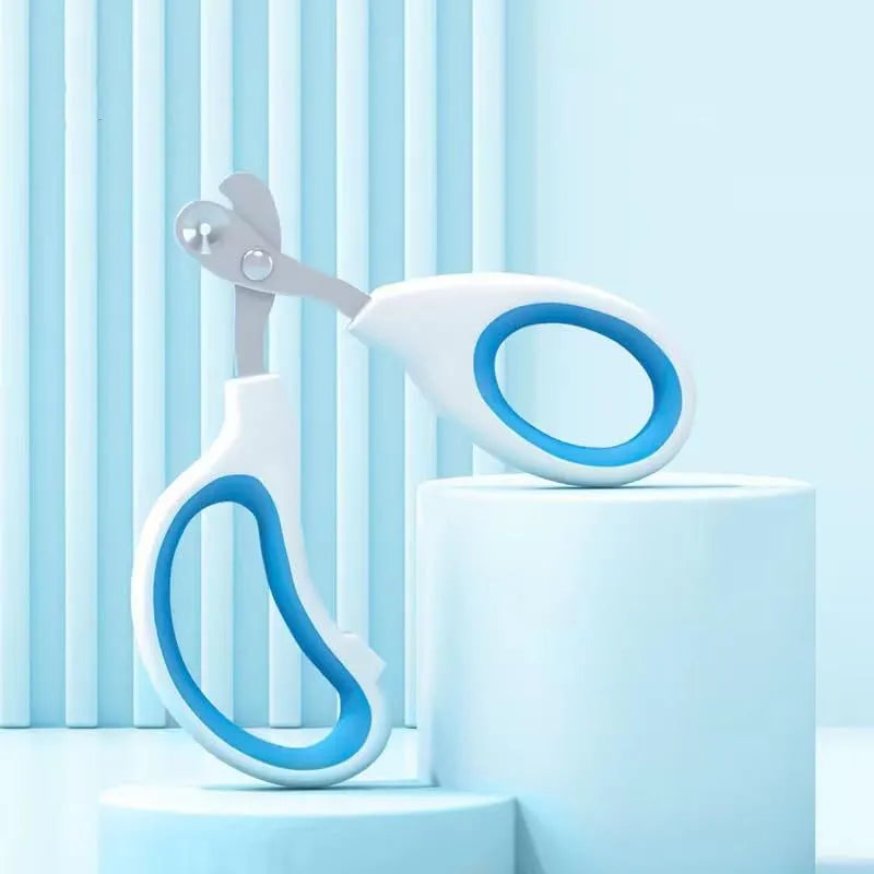 Blue cat nail clippers with circular cut hole and cushioned non-slip handles on a white background.