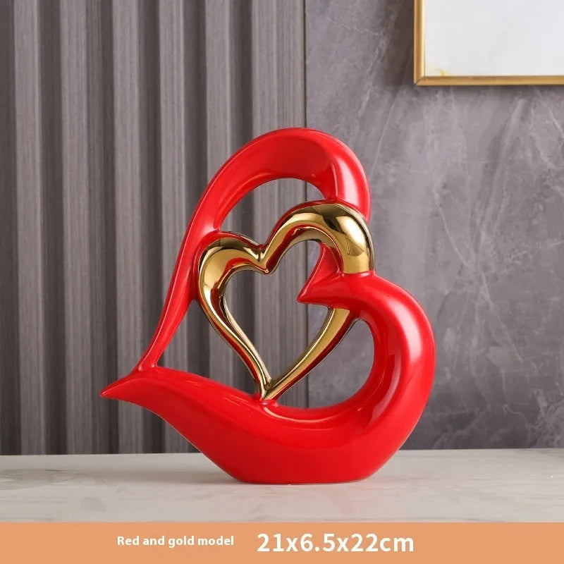 Modern white porcelain love heart ornament with a choice of metallic gold, silver and coloured finishes.