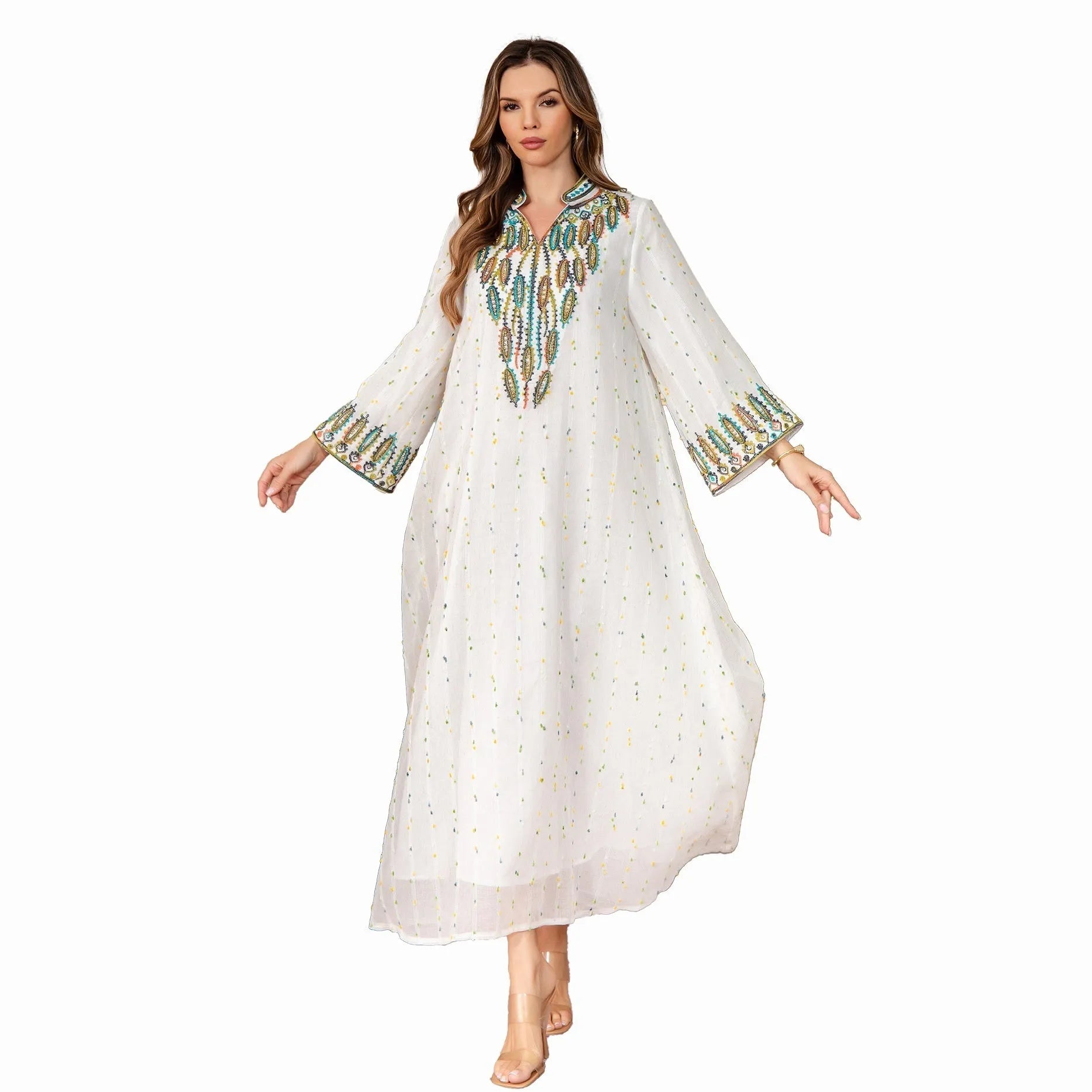 White floor-length Arabic robe with long sleeves on a hanger.