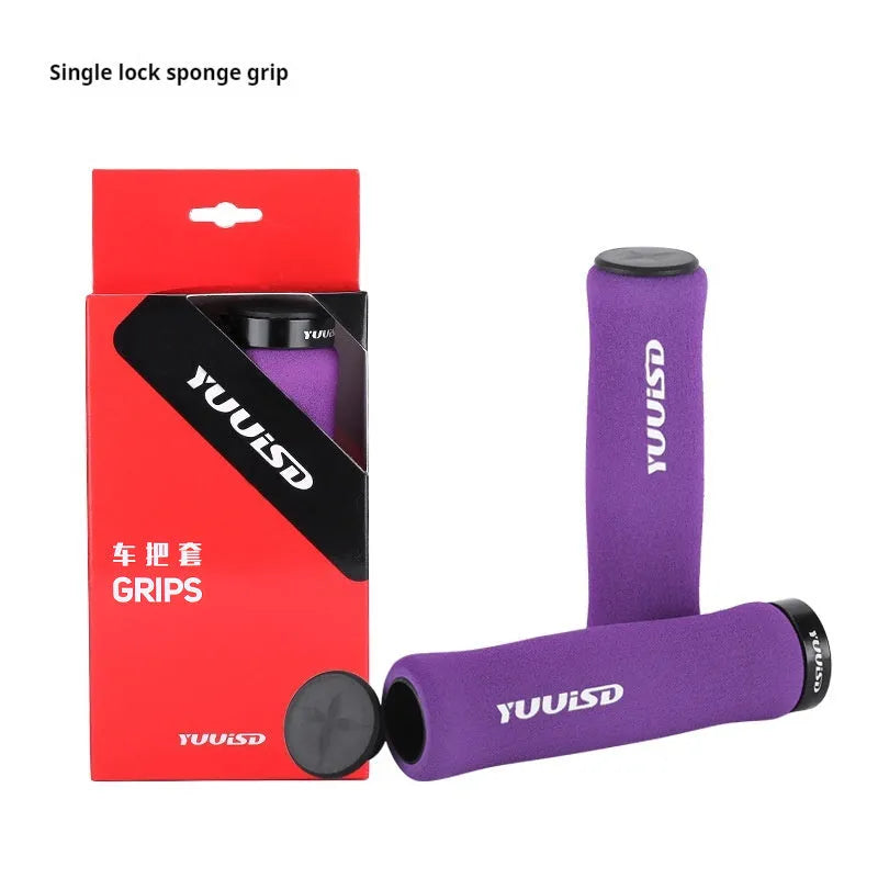 Pair of ultra-light 41g soft sponge mountain bike handlebar grips with lock design in black, purple, and biange colours.