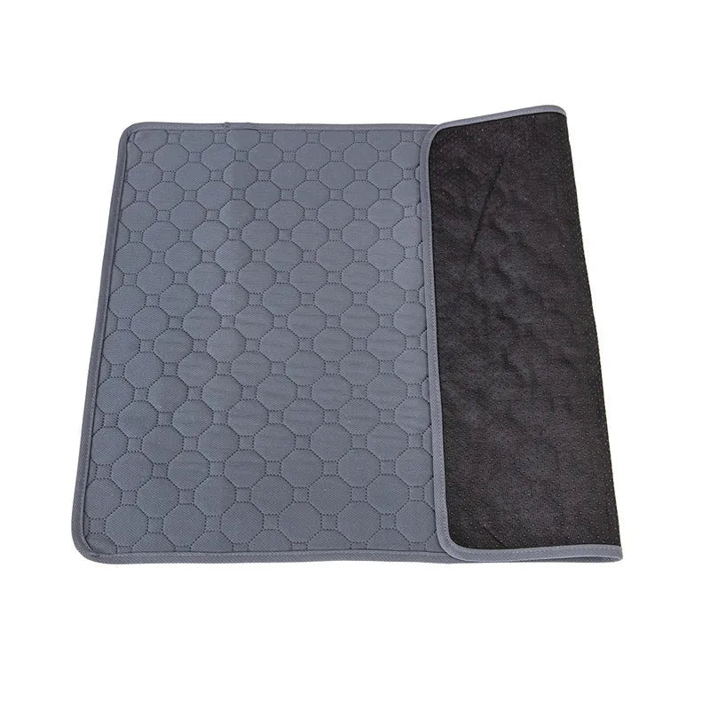 Grey and tan washable dog pee pads showing waterproof backing and size options