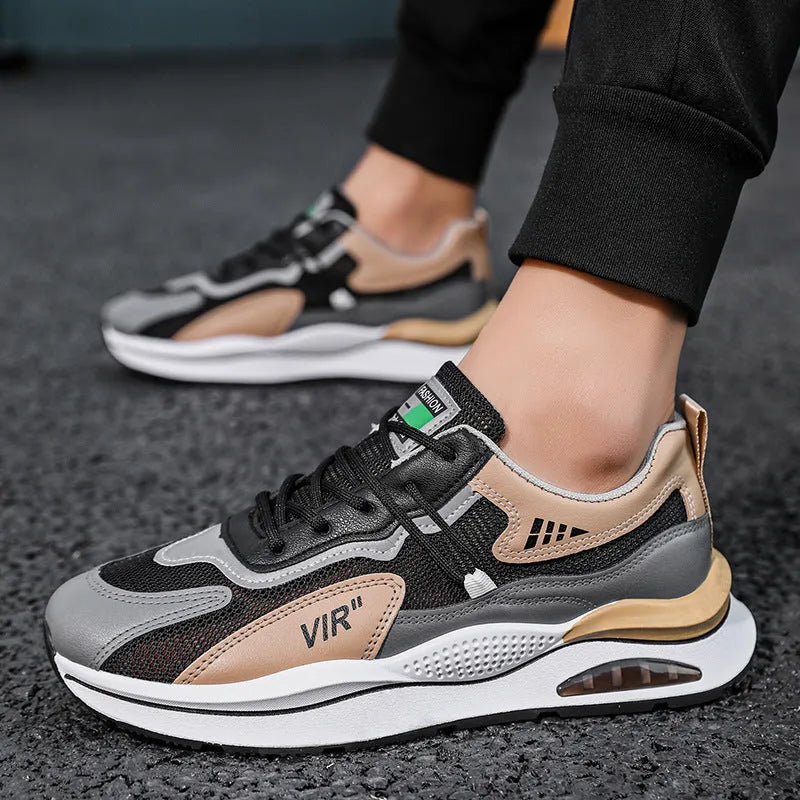 Men's grey and black breathable mesh casual running shoes with a round toe and lightweight EVA sole.