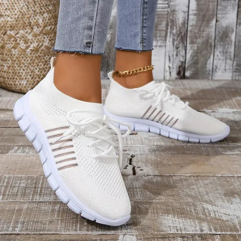 Women's breathable mesh flat shoes in various colours with round toe and lace front