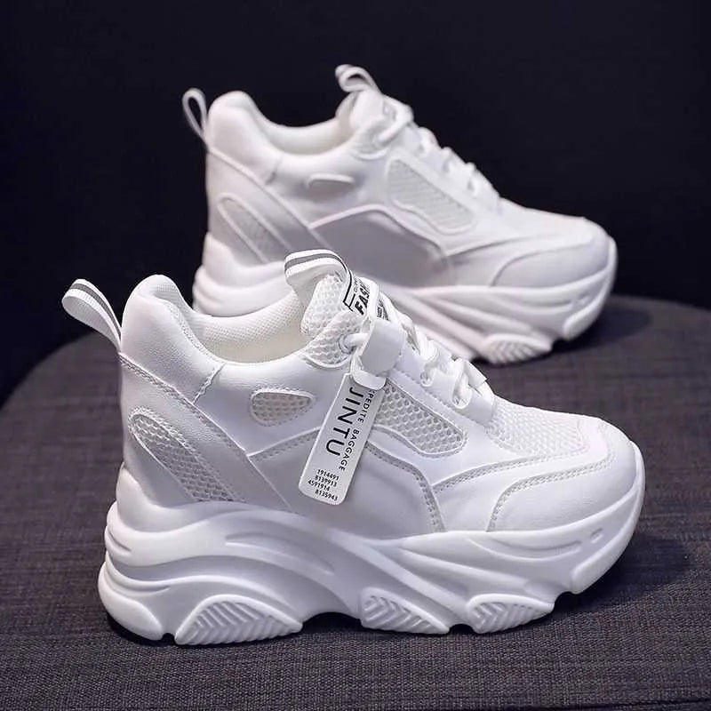 Women's black mesh platform casual shoes with hollow out details and a toe holder.