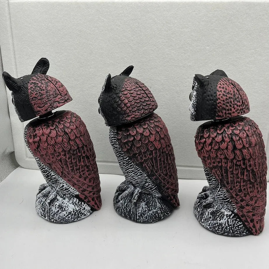 Realistic plastic artificial owl bird deterrent ornament with shaking head, for outdoor use.