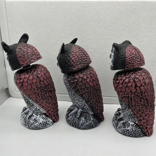Realistic plastic artificial owl bird deterrent ornament with shaking head, for outdoor use.