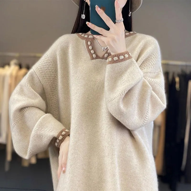 Women's camel coloured V-neck pullover sweater with long sleeves, made from viscose fibre.