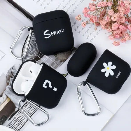 Black and Pink Apple AirPods silicone covers with Flower, Smiley, and Love designs.