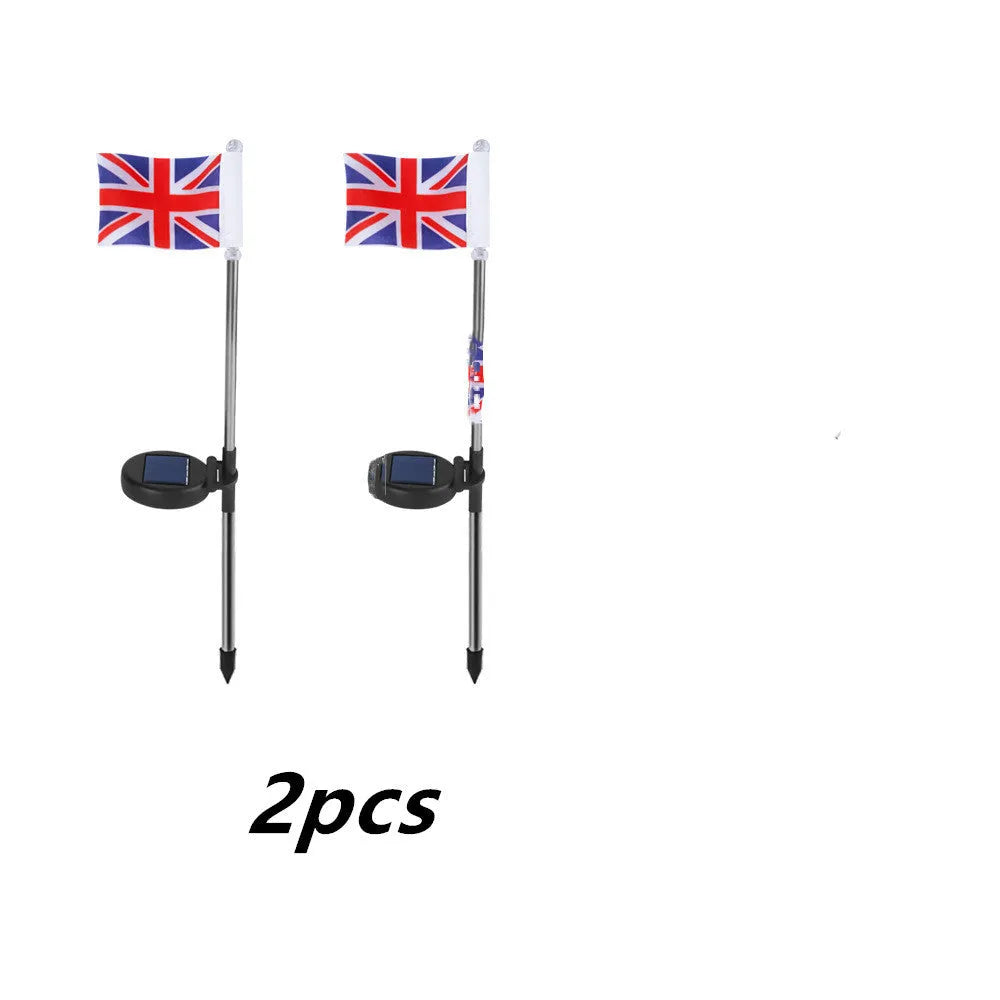 Solar-powered garden flag light with stainless steel pole displaying American or British flag design