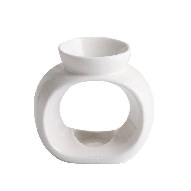 White ceramic Nordic style aromatherapy stove ornament with anti-dry burning design