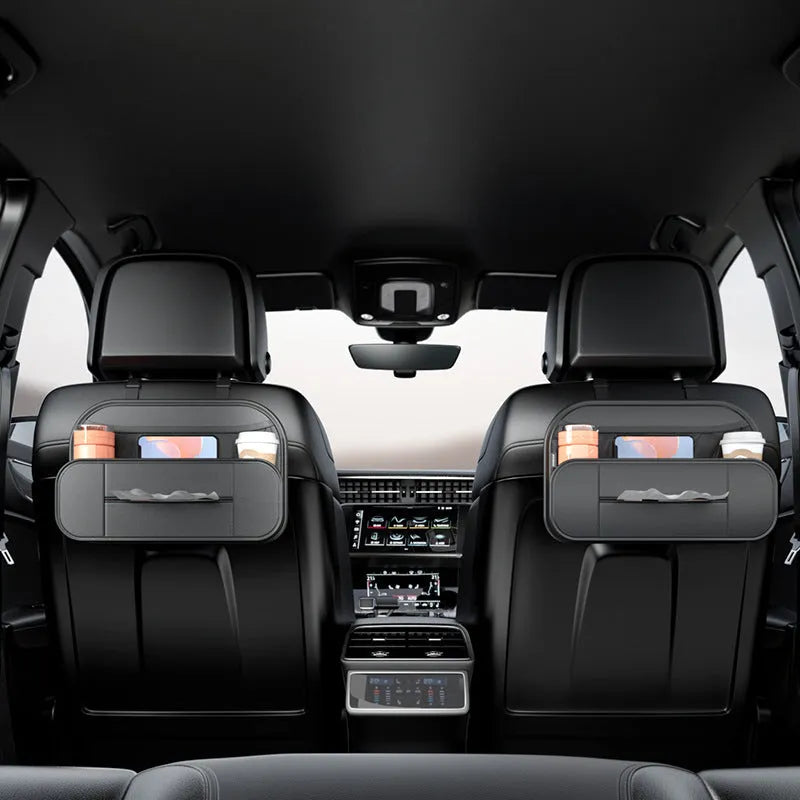 Black leather car seat back storage bag with customisable compartments measuring 36cm wide