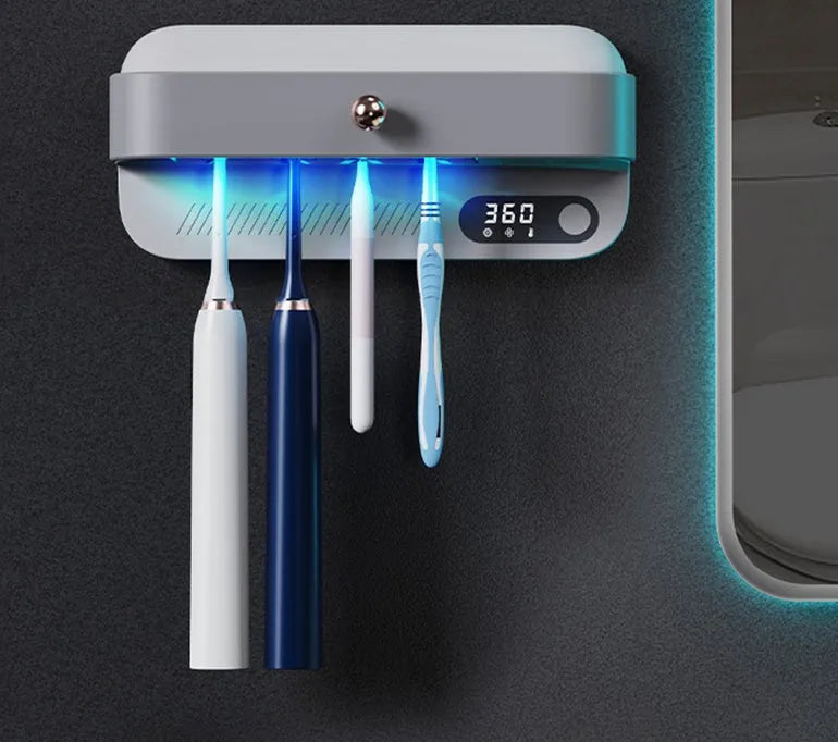 White wall-mounted UV toothbrush steriliser with USB charging port