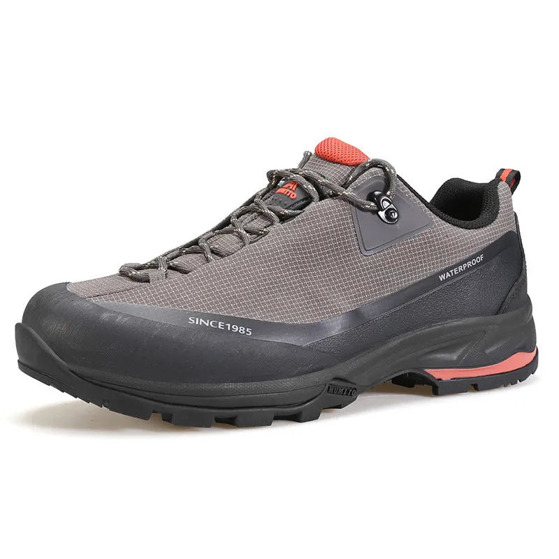Low-top mountain climbing shoes with leather mesh upper and non-slip rubber sole in black-red and beige-maroon colour options for men and women.