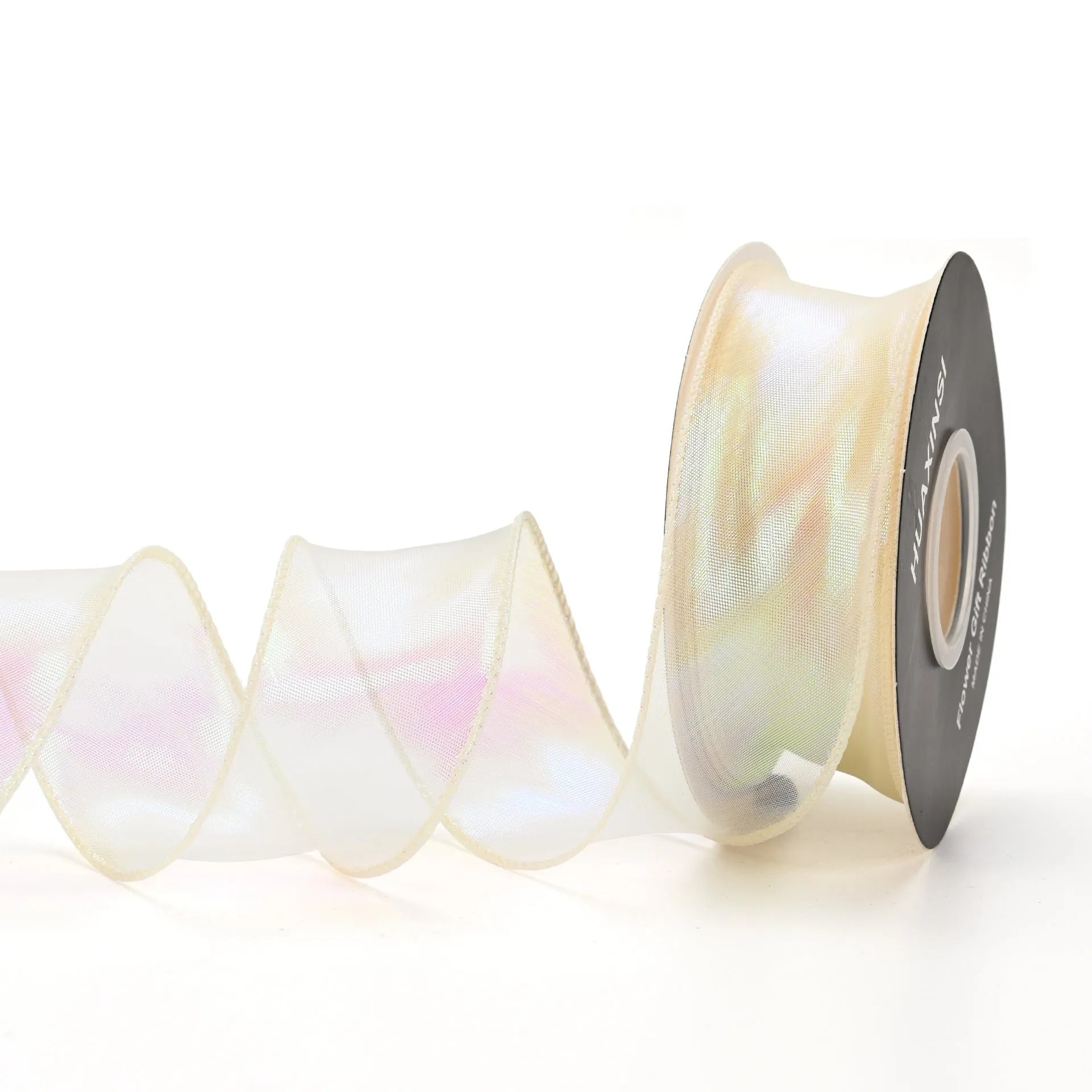 Roll of 4cm wide fishtail yarn mesh ribbon in a choice of eight illusion colours for craft and floral use.