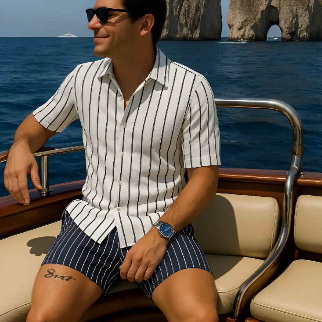 Men's light blue elastic beach shirt and shorts matching set laid flat