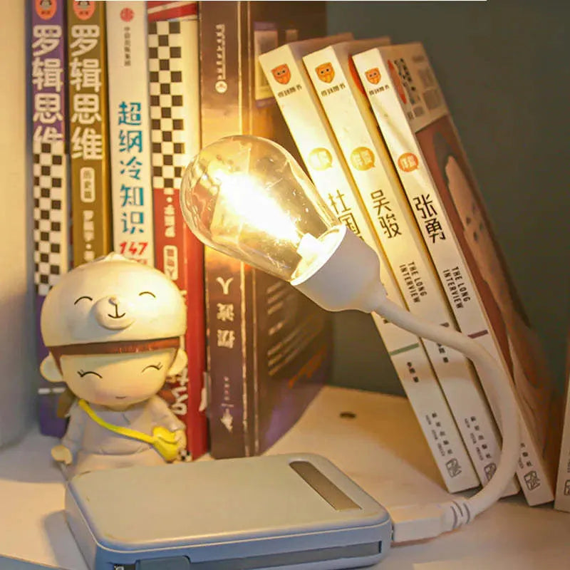 USB rechargeable folding tungsten night light with S14 bulb showing warm 2700K illumination