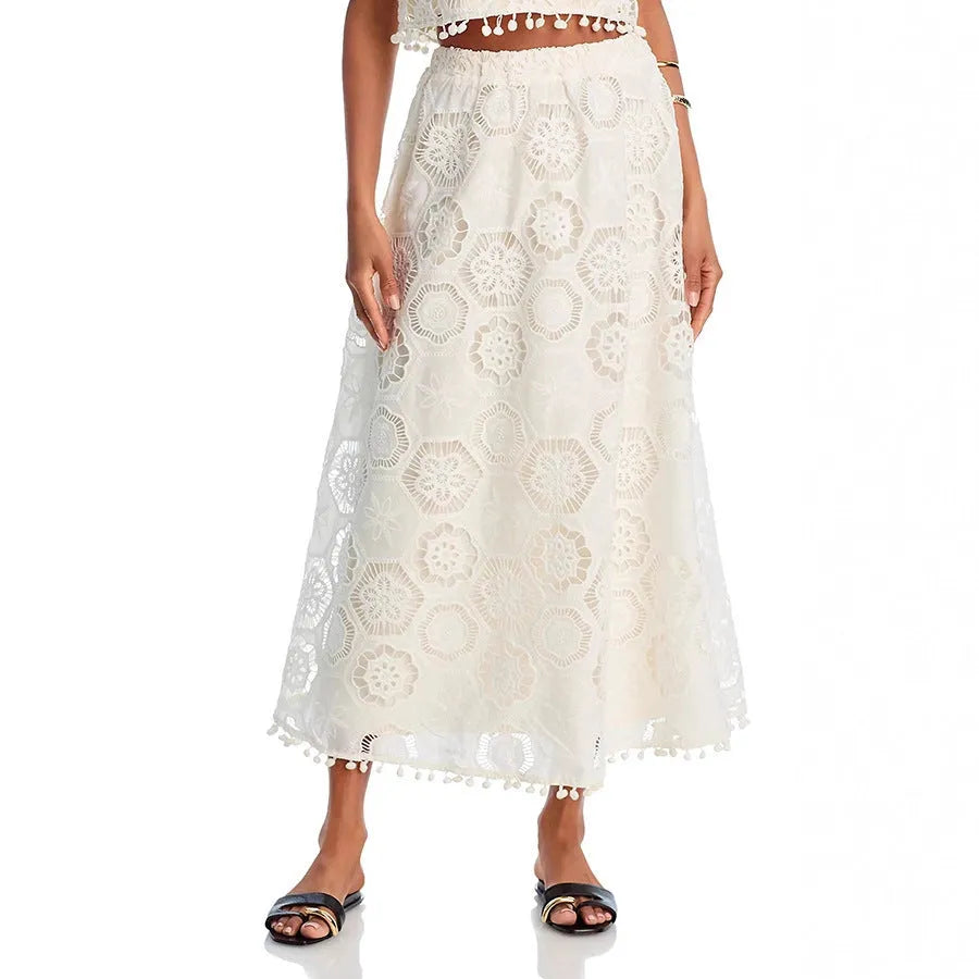 White women's sleeveless top and long embroidered skirt retro suit set