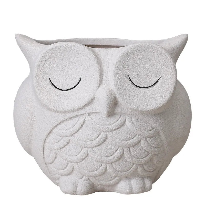 Handmade frosted ceramic flower pot with cartoon owl design for succulents.