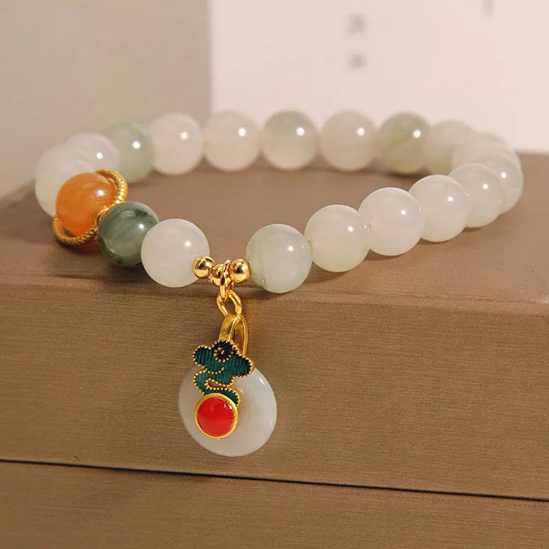 Women's ice jade crystal bracelet with Xiangyun peace buckle and pearl accents