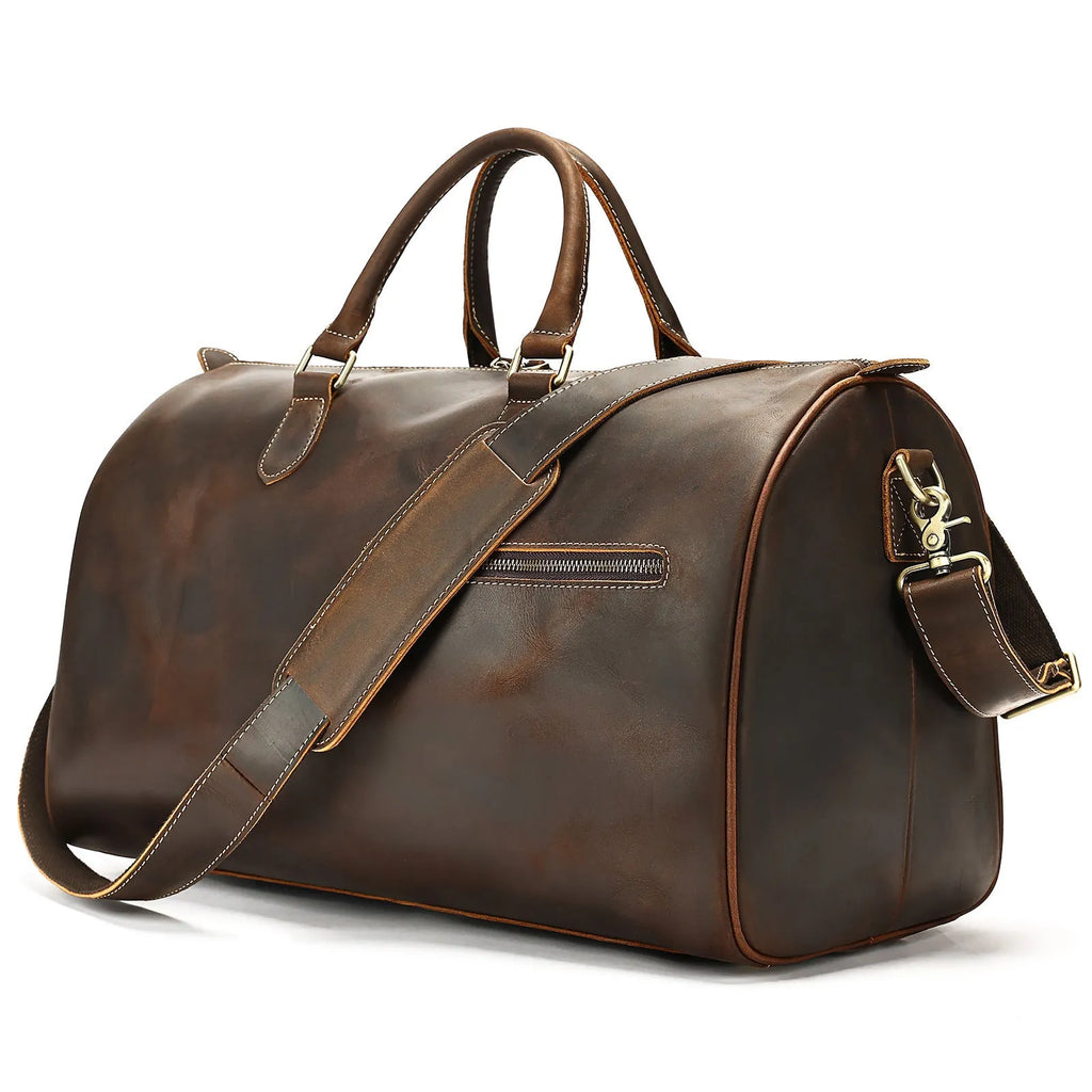 Large vintage brown leather crossbody bag for men with shoulder strap.