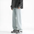 Men's washed light blue straight leg jeans with button waist in cotton denim